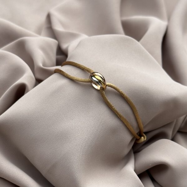 Trinity bracelet goud