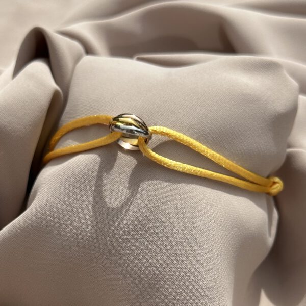 Trinity bracelet donker geel
