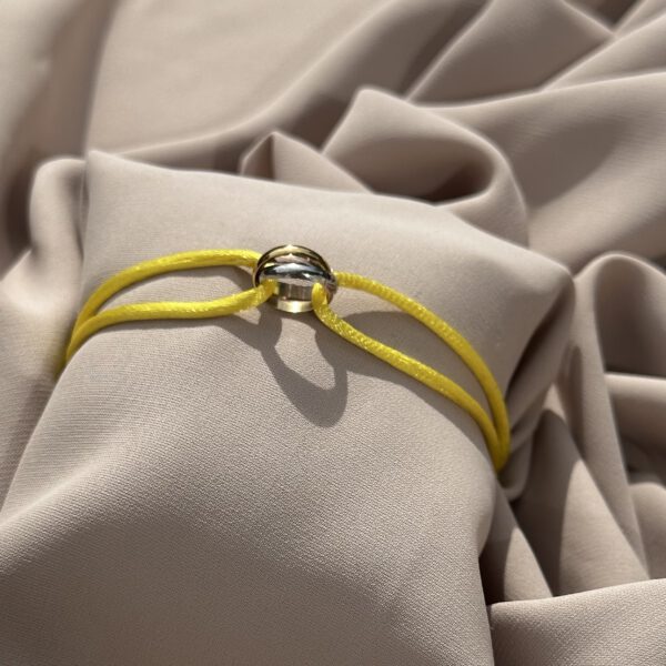 Trinity bracelet geel